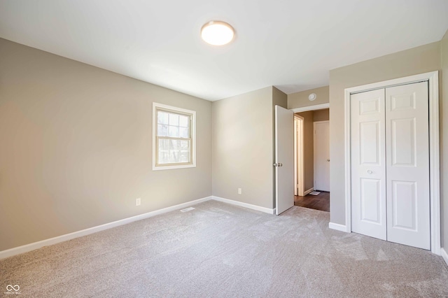 1920 E Wexley Rd, Bloomington, IN 47401 - unfurnished bedroom featuring carpet floors and a closet