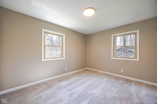 1920 E Wexley Rd, Bloomington, IN 47401 - spare room with light colored carpet and baseboards