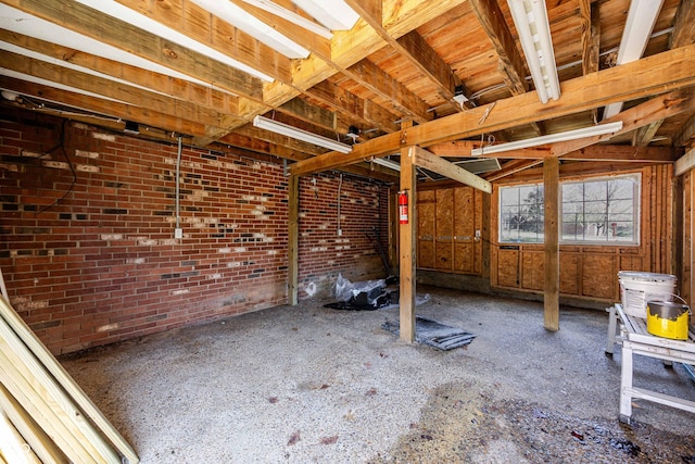 1920 E Wexley Rd, Bloomington, IN 47401 - miscellaneous room featuring brick wall
