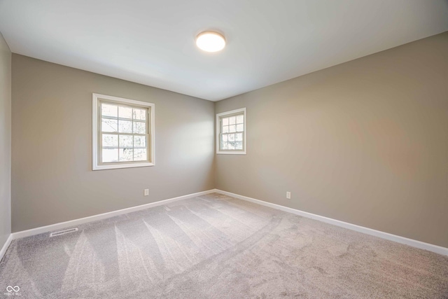 1920 E Wexley Rd, Bloomington, IN 47401 - carpeted empty room featuring baseboards