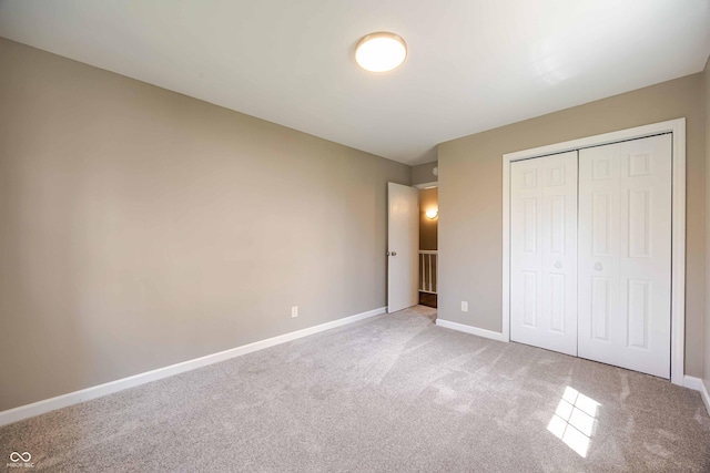 1920 E Wexley Rd, Bloomington, IN 47401 - unfurnished bedroom with carpet flooring and a closet
