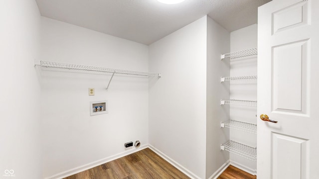 3916 Jekyll Ct, Indianapolis, IN 46237 - laundry area with dark wood-type flooring, hookup for a washing machine, and baseboards