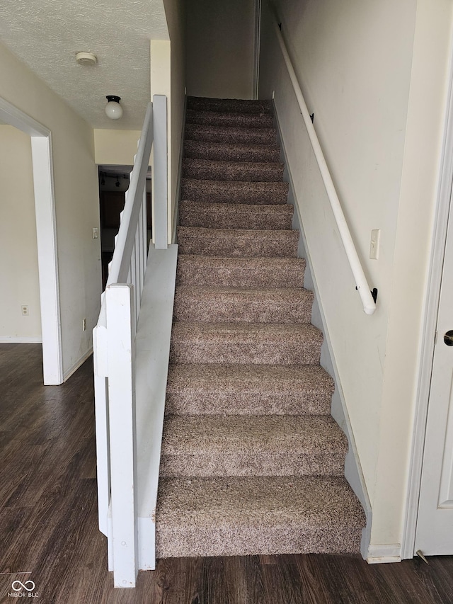 3916 Jekyll Ct, Indianapolis, IN 46237 - staircase featuring wood finished floors and baseboards
