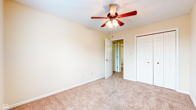 3916 Jekyll Ct, Indianapolis, IN 46237 - unfurnished bedroom featuring carpet floors, baseboards, a closet, and ceiling fan