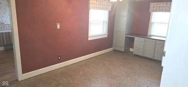 3107 N 100 W, Shelbyville, IN 46176 - kitchen featuring baseboards, speckle patterned floor, and baseboard heating