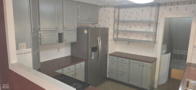 3107 N 100 W, Shelbyville, IN 46176 - kitchen featuring backsplash, dark countertops, stainless steel fridge, and open shelves