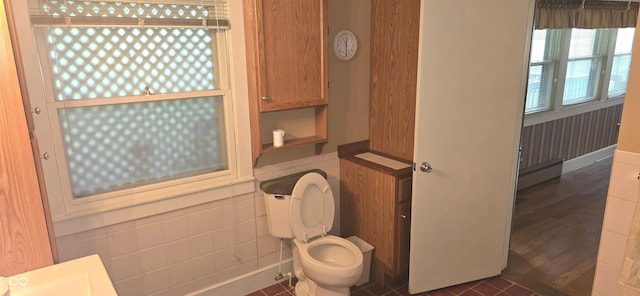 3107 N 100 W, Shelbyville, IN 46176 - bathroom featuring toilet, a baseboard heating unit, and wood finished floors