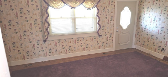 3107 N 100 W, Shelbyville, IN 46176 - entryway featuring baseboards, wallpapered walls, and dark wood finished floors