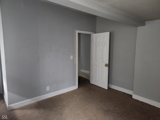 2707-2709 N College Ave, Indianapolis, IN 46205 - carpeted spare room featuring baseboards