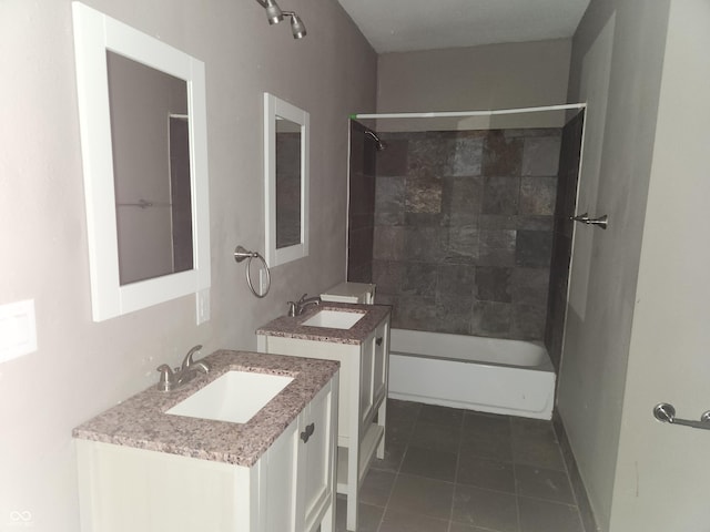 2707-2709 N College Ave, Indianapolis, IN 46205 - full bath featuring tub / shower combination, two vanities, and tile patterned flooring