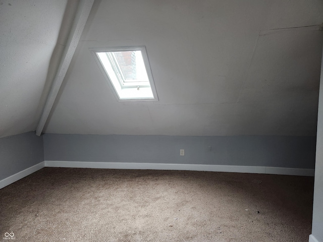 2707-2709 N College Ave, Indianapolis, IN 46205 - additional living space with a skylight, carpet flooring, and baseboards