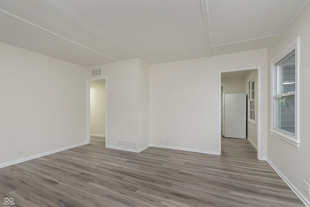 625 E 106th St, Carmel, IN 46280 - spare room with wood finished floors and baseboards