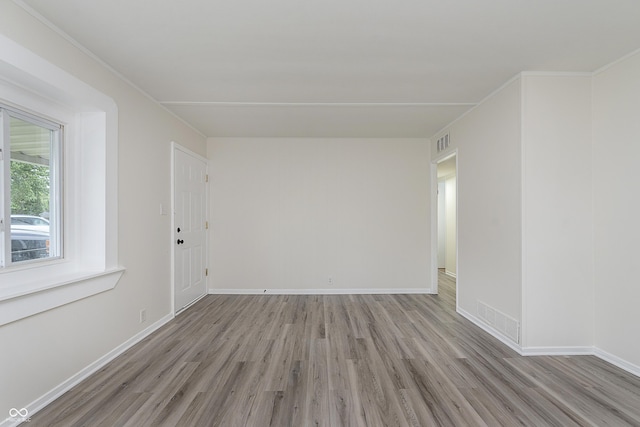 625 E 106th St, Carmel, IN 46280 - empty room featuring light wood-style flooring and baseboards
