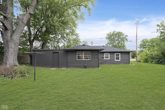 625 E 106th St, Carmel, IN 46280 - back of house featuring a lawn