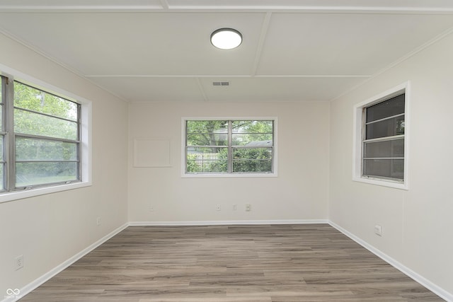 625 E 106th St, Carmel, IN 46280 - spare room featuring light wood finished floors and baseboards