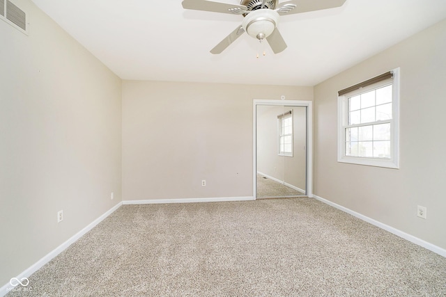 10245 Briar Creek Ln, Carmel, IN 46033 - unfurnished bedroom featuring carpet floors, baseboards, a ceiling fan, and a closet