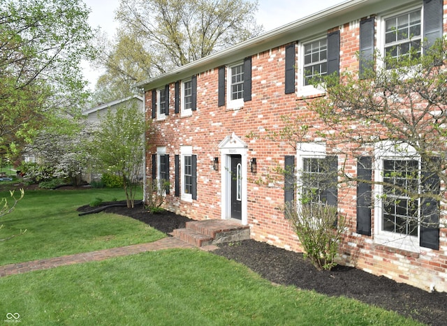 10245 Briar Creek Ln, Carmel, IN 46033 - colonial home with a front lawn and brick siding