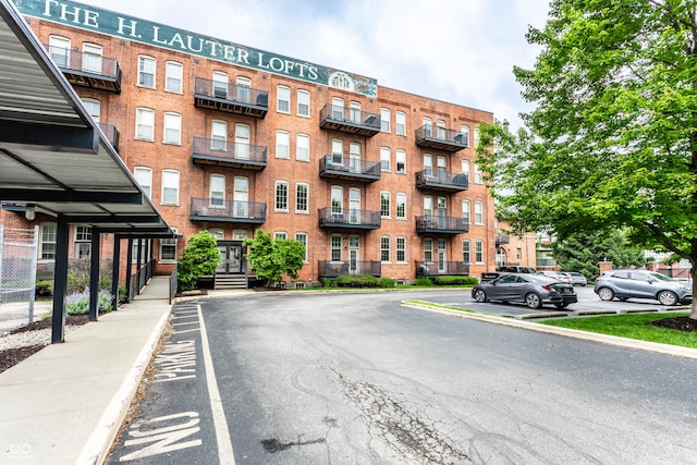 55 S Harding St Unit 308, Indianapolis, IN 46222 - view of apartment building / complex featuring uncovered parking