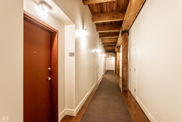 55 S Harding St Unit 308, Indianapolis, IN 46222 - corridor featuring wooden ceiling with exposed beams and baseboards