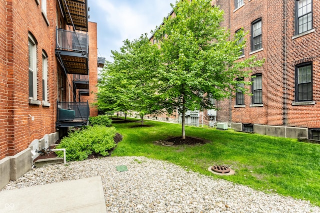 55 S Harding St Unit 308, Indianapolis, IN 46222 - view of community featuring a yard