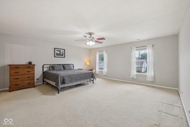764 Port Dr, Avon, IN 46123 - carpeted bedroom with multiple windows, baseboards, and a textured ceiling