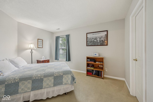 764 Port Dr, Avon, IN 46123 - bedroom with light carpet, baseboards, and a textured ceiling