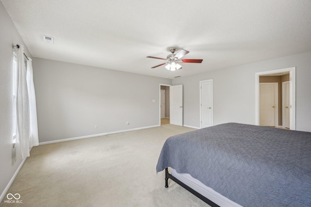 764 Port Dr, Avon, IN 46123 - bedroom featuring baseboards, light colored carpet, and a ceiling fan