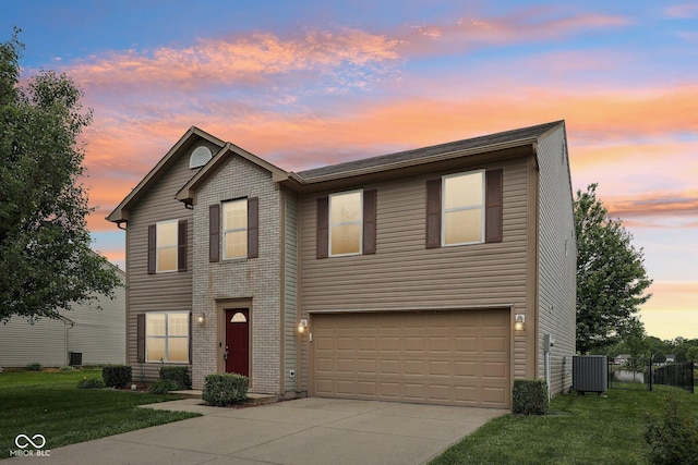 764 Port Dr, Avon, IN 46123 - traditional home featuring driveway, an attached garage, and central AC unit