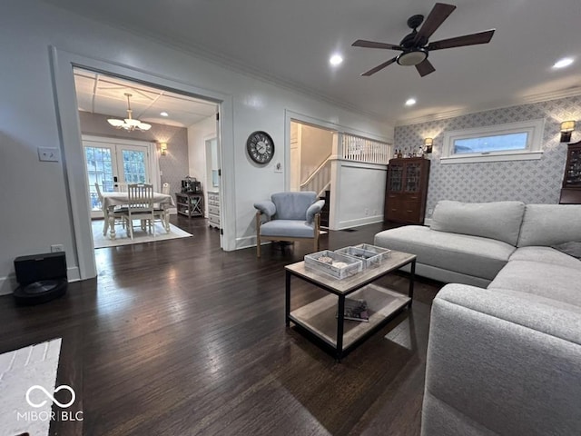 4040 Carrollton Ave, Indianapolis, IN 46205 - living area featuring wallpapered walls, a chandelier, stairway, baseboards, and crown molding