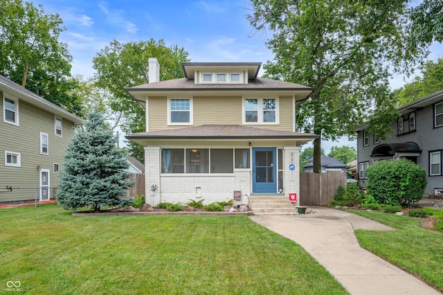 4040 Carrollton Ave, Indianapolis, IN 46205 - american foursquare style home with brick siding, a chimney, entry steps, and roof with shingles