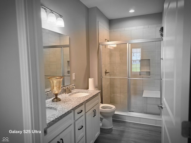 9106 Hedley Way E, Avon, IN 46123 - full bathroom with toilet, double vanity, a stall shower, and recessed lighting