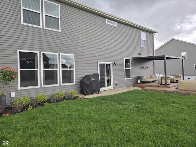 8876 Boylan Pl, Pendleton, IN 46064 - back of house featuring an outdoor living space, a lawn, and a patio area