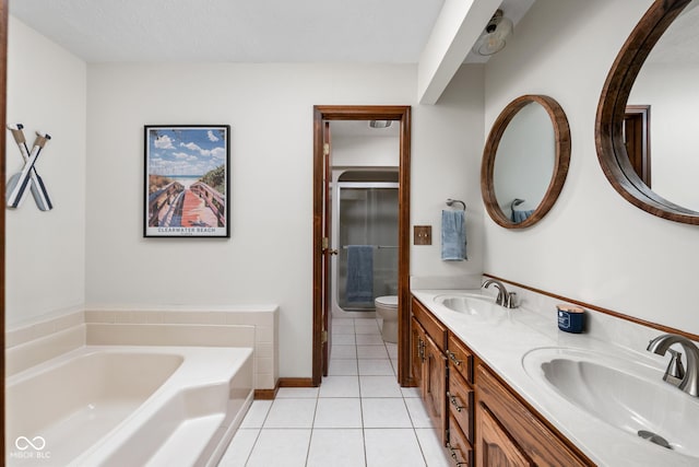 5412 Green Hills Dr, Brownsburg, IN 46112 - full bath with toilet, a garden tub, tile patterned floors, double vanity, and a stall shower