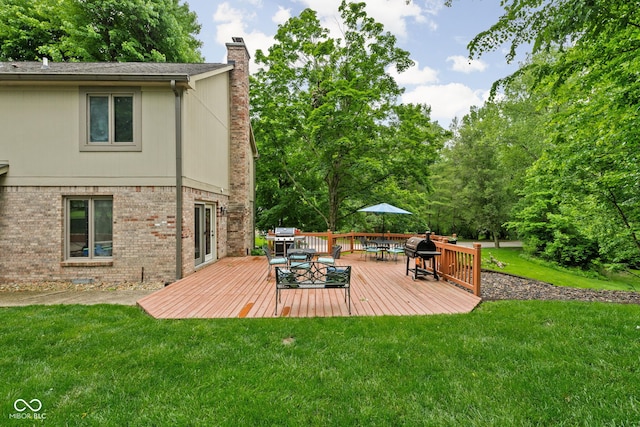 5412 Green Hills Dr, Brownsburg, IN 46112 - deck with a lawn, outdoor dining area, and grilling area