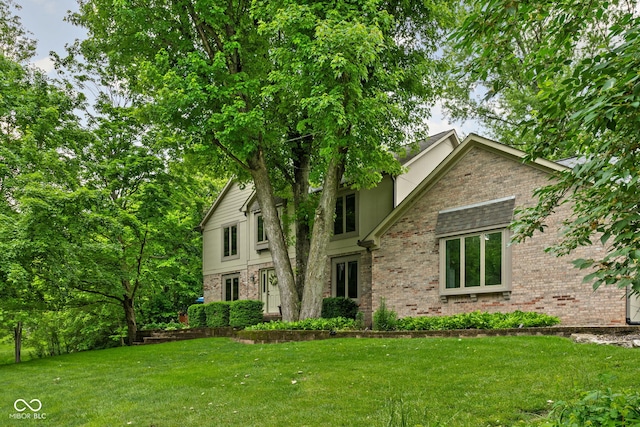 5412 Green Hills Dr, Brownsburg, IN 46112 - view of front facade featuring brick siding and a front yard