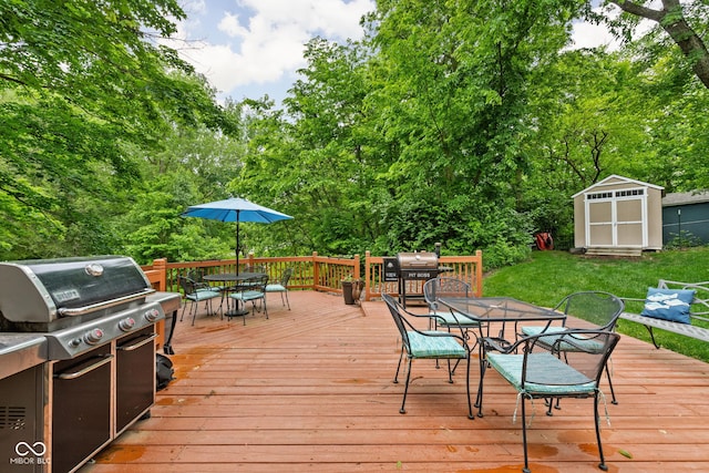 5412 Green Hills Dr, Brownsburg, IN 46112 - wooden terrace with outdoor dining area, a lawn, view of scattered trees, and area for grilling