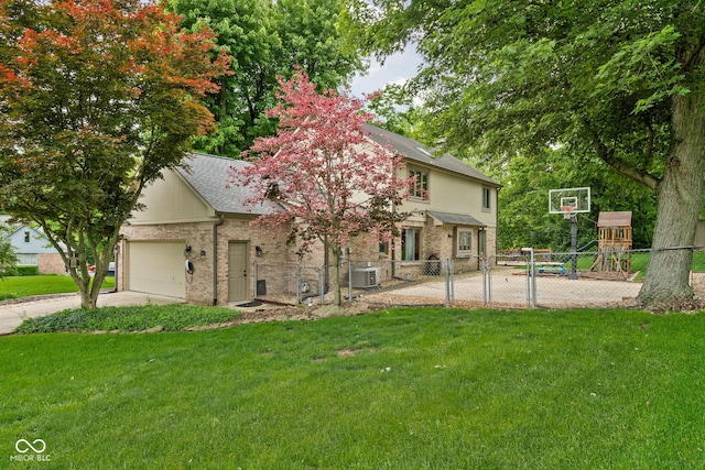 5412 Green Hills Dr, Brownsburg, IN 46112 - view of front of home with cooling unit, driveway, a garage, brick siding, and a shingled roof