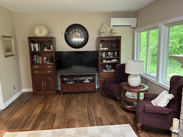 308 Bay Ridge Dr, Pendleton, IN 46064 - living room featuring an AC wall unit, dark wood-type flooring, and baseboards