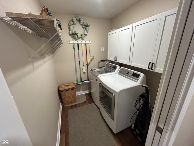 308 Bay Ridge Dr, Pendleton, IN 46064 - washroom with dark wood-style floors, independent washer and dryer, cabinet space, and baseboards