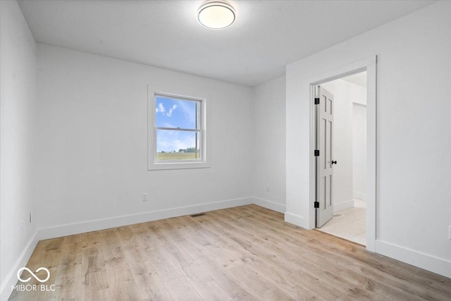 9605 W 100 S, Jamestown, IN 46147 - unfurnished bedroom featuring wood finished floors and baseboards