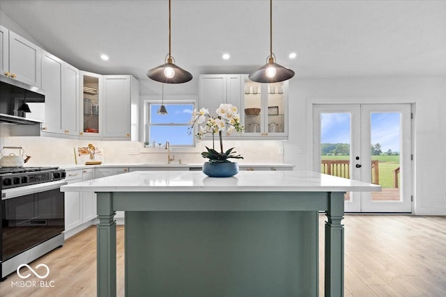9605 W 100 S, Jamestown, IN 46147 - kitchen featuring stainless steel appliances, healthy amount of natural light, a kitchen bar, tasteful backsplash, and recessed lighting