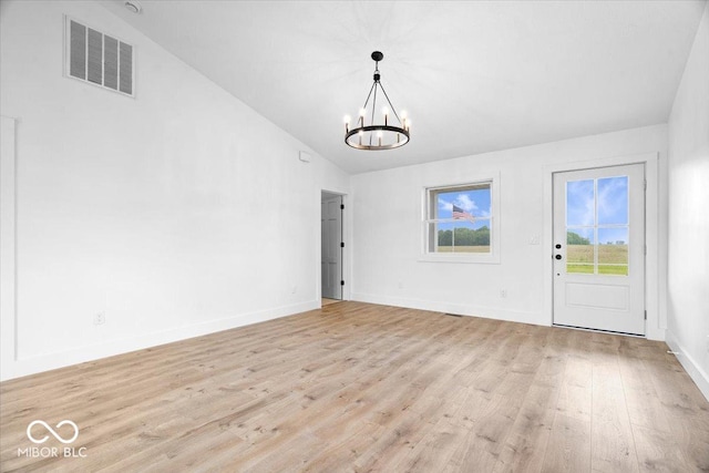 9605 W 100 S, Jamestown, IN 46147 - unfurnished dining area featuring a chandelier, lofted ceiling, light wood-type flooring, and baseboards
