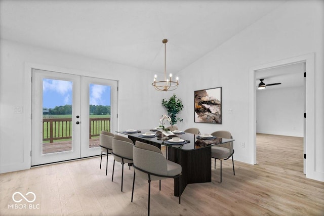 9605 W 100 S, Jamestown, IN 46147 - dining area featuring french doors, light wood-style floors, vaulted ceiling, a chandelier, and baseboards