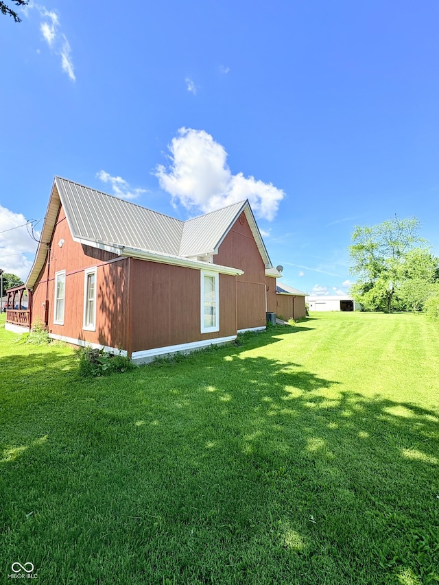 404 S Indiana St, Roachdale, IN 46172 - view of home's exterior with a lawn and metal roof