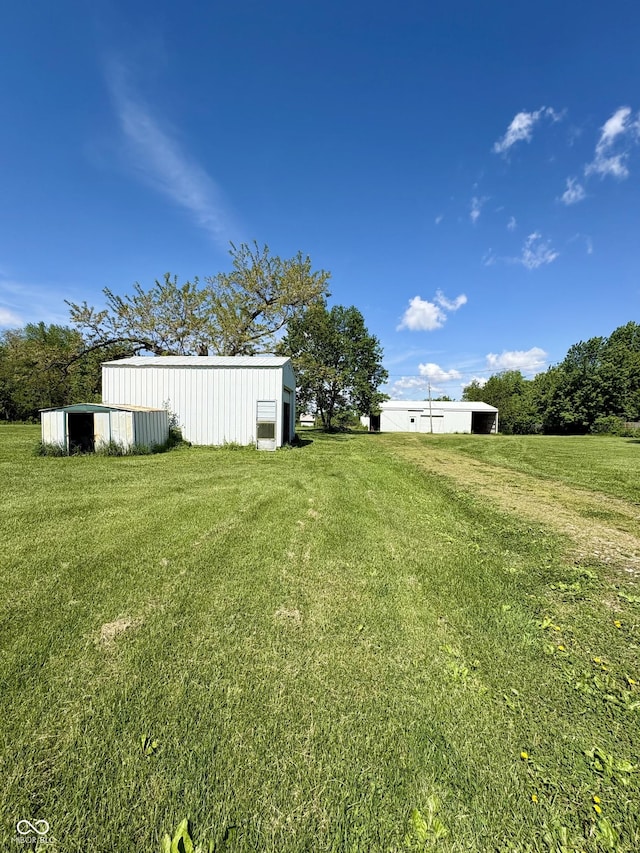 404 S Indiana St, Roachdale, IN 46172 - view of green lawn featuring an outbuilding and an outdoor structure