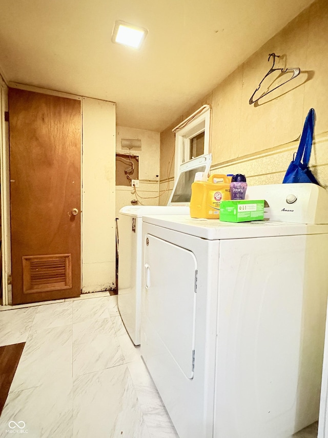 404 S Indiana St, Roachdale, IN 46172 - washroom featuring washing machine and dryer and light marble finish floors