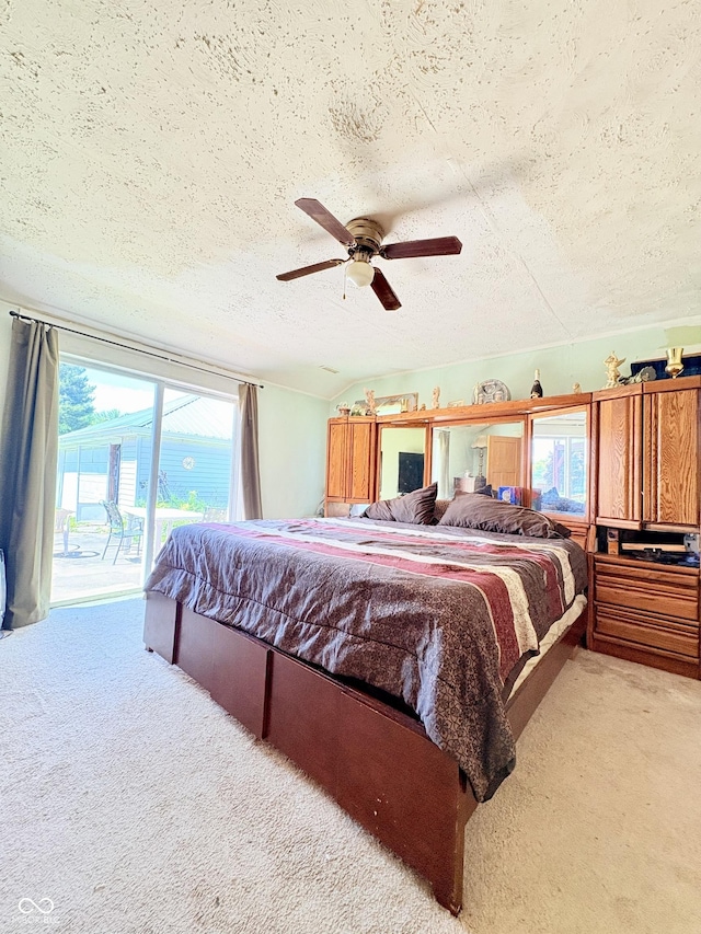 404 S Indiana St, Roachdale, IN 46172 - bedroom featuring access to outside, light colored carpet, a textured ceiling, multiple windows, and ceiling fan