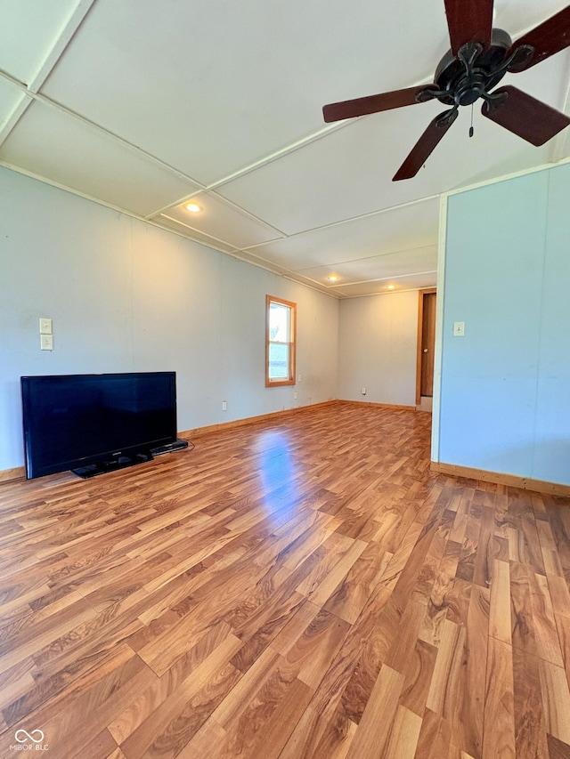 404 S Indiana St, Roachdale, IN 46172 - unfurnished living room with wood finished floors, ceiling fan, and recessed lighting
