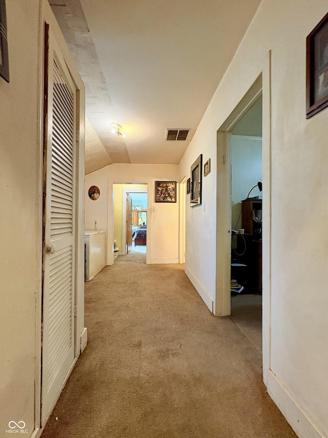 404 S Indiana St, Roachdale, IN 46172 - hall with carpet, lofted ceiling, and baseboards