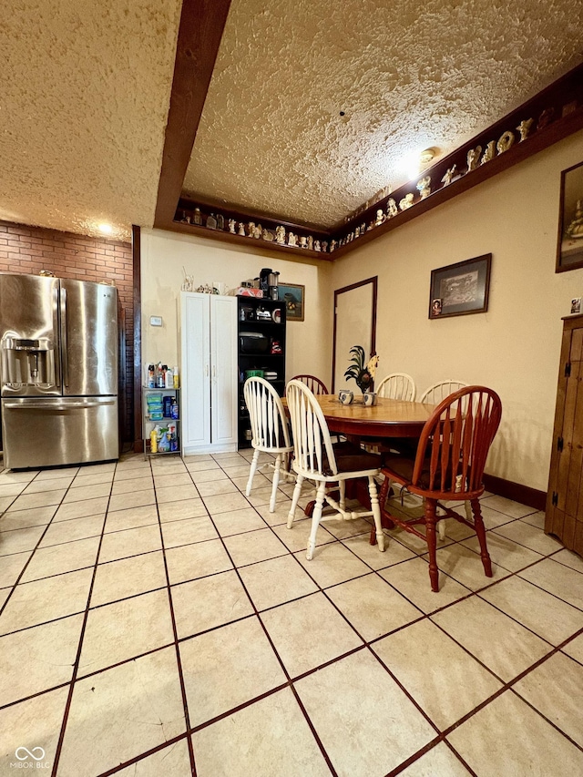 404 S Indiana St, Roachdale, IN 46172 - tiled dining room with a textured ceiling